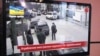 ATR Акмәчеттә чит ил журналистын талауны төшереп алган тасманы күрсәтә. 7 март 2014