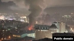 Smoke rises from a residential building following an explosion in Novosibirsk on February 9.