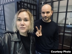 Tatyana Usmanova (left) and her fiance, Andrei Pivovarov (file photo)