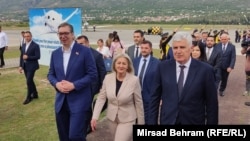 Serbian President Aleksandar Vucic (left) arrived at Mostar airport welcomed by Borjana Kristo, chairwomen of Bosnia's Council of Ministers, and Dragan Covic (right), deputy chairmen of the House of Peoples of the Bosnian parliament.