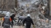 Rescuers work at the site of a Russian drone attack in Odesa on March 2. 