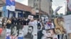 Members of the far right and hooligan groups protest against the festival in Belgrade on June 27.