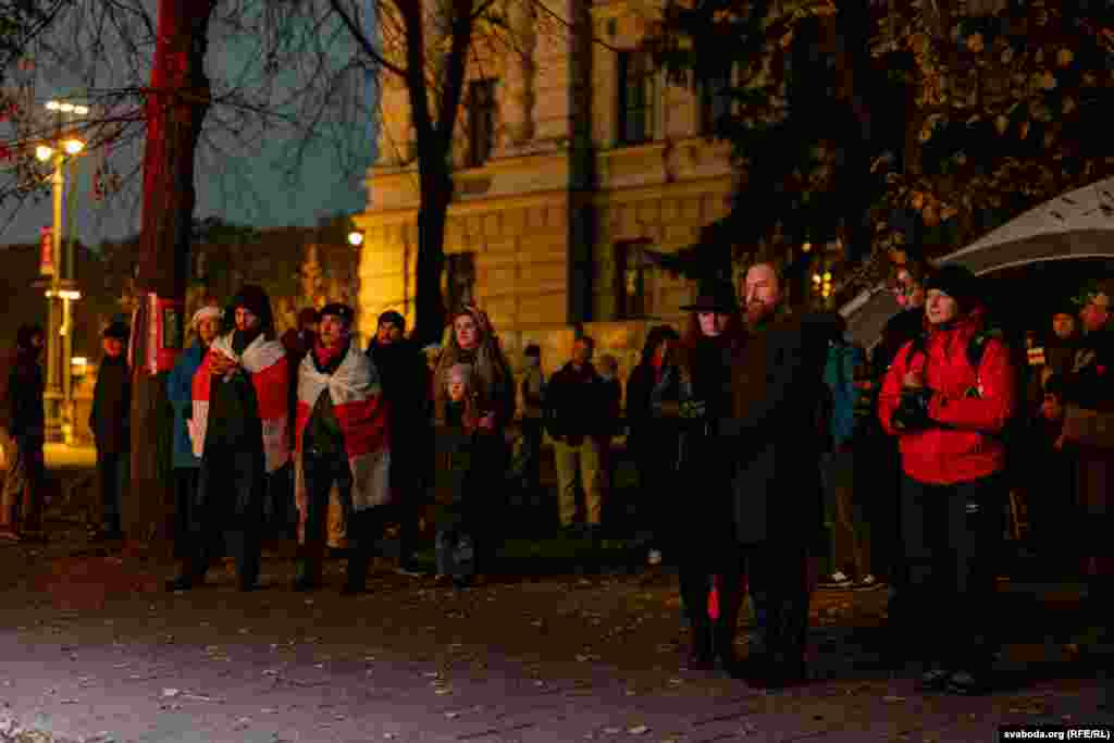 Onlookers stand by during the solemn memorial. The persecution in Belarus was part of Soviet dictator Josef Stalin's repressive policies aimed at eradicating perceived threats to his regime. The killings that took place on October 29–30, 1937, became known as the Night of the Shot Poets. 