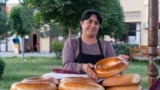 UZBEKISTAN -- SAMARKAND, MAY 15, 2023 -- seller of traditional bread