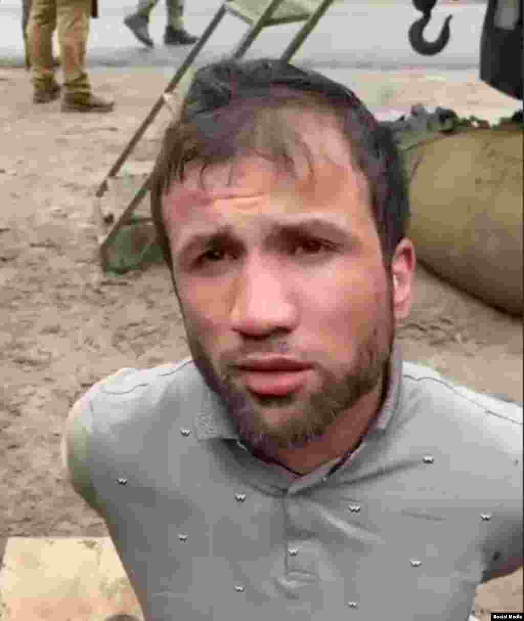 Faridun Shamsiddin is shown apparently unscathed immediately after his capture in the Bryansk region on March 23. 