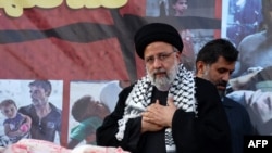 Iranski predsjednik Ebrahim Raisi obraća se masi okupljenoj na protestu u Teheranu u znak podrške Palestincima u Gazi 18. oktobra 2023.