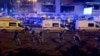 Russia - OMON security forces outside Crocus City Hall where gunmen opened fire at concert - screen grab