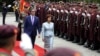 Outgoing President Stevo Pendarovski (left) turns over North Macedonia's presidency on May 12 to Gordana Siljanovska-Davkova, who won election four days earlier.
