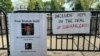 Relatives of Shahab Dalili protested outside the White House on August 13 with signs calling for his release. 