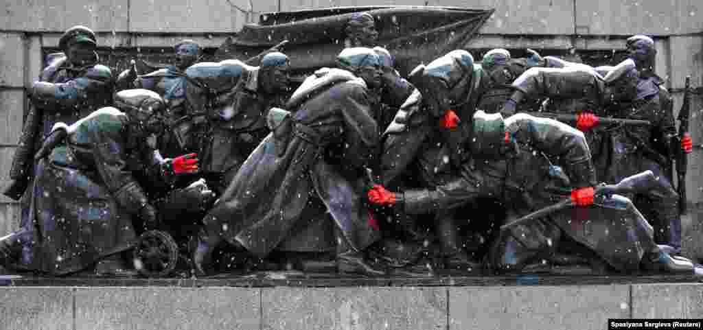 The memorial was given its own security in 2018. But despite the heightened security, since February 24, 2022, when Russia launched its full-scale invasion of Ukraine, the monument has been attacked multiple times. This image, showing Soviet soldiers with their hands spray-painted red, was made on February 27, 2022.