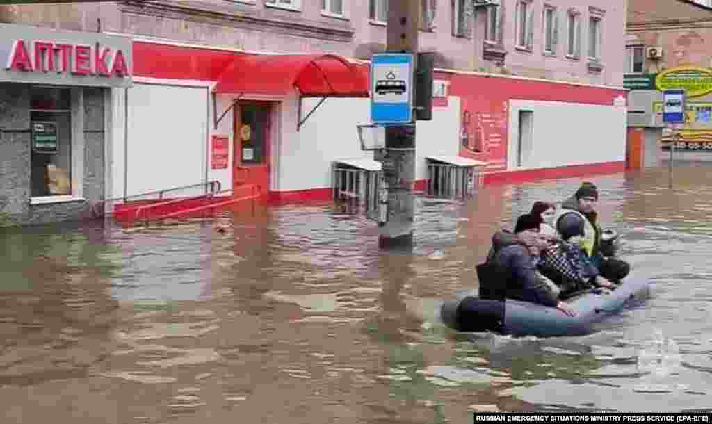 Residents being evacuated by raft amid the floodwaters in Orsk. More than 10,400 homes across nearly 40 regions of Russia have been flooded due to heavy rains and snowmelt, with more flash flooding expected, the Russian Emergency Situations Ministry's press service said on April 8. 