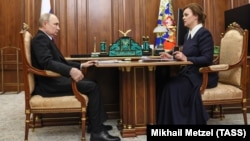 Russian President Vladimir Putin (left) meets with Anna Tsivilyova at the Kremlin in April.
