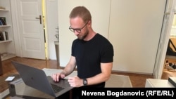 Andrey Hnyot photographed on June 14 at home in Belgrade, where he is under house arrest and fighting extradition to Belarus.
