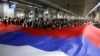 Protesters block the tracks at Belgrade's main railway station on August 10 to protest the government's plan to reboot the Rio Tinto lithium-mine project.