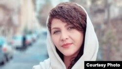 Zeinab Rahimi is the fifth journalist to face legal action after commenting on the death of Garavand, highlighting government's crackdown on dissenting voices in the media.
