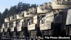 The Bradley fighting vehicle, a medium-armored combat vehicle, can serve as a fortified troop carrier on the battlefield. It has tracks but is lighter and more agile than a tank. (file photo)