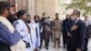 Taliban Deputy Prime Minister Mullah Abdul Ghani Baradar and other Taliban officials greet Chinese Foreign Minister Wang Yi in Kabul on March 24.