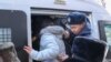 More than a dozen activists were detained in Almaty on December 16. 