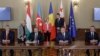 (Left to right) Hungarian Prime Minister Viktor Orban, Azerbaijani President Ilham Aliyev, Romanian President Klaus Iohannis, and Georgian Irakli Garibashvili at the signing ceremony in Bucharest on December 17.