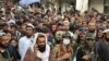 Demonstrators take part in a protest in Khost on April 16 against Pakistani air strikes in the province overnight.