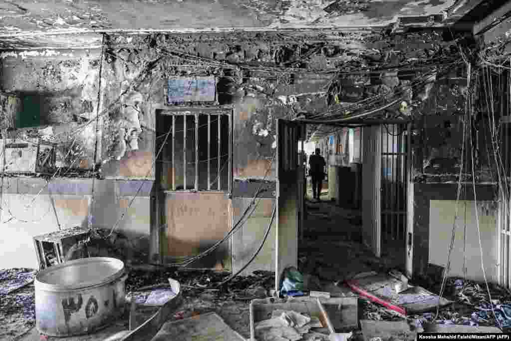A fire-damaged room inside Evin prison seen on October 16. At least eight people reportedly died during violence at the facility. It is unclear if the prison blaze is linked to the unrest sparked by the death of Amini. 