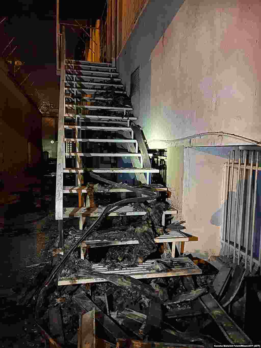 Damage on a stairwell, apparently near the outer wall of Evin prison. The facility is notorious for well-documented abuses, and on-site executions. 