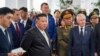North Korean leader Kim Jong Un (center left) visits a Russian aircraft plant that builds fighter jets in Komsomolsk-on-Amur, Russia, on September 15.