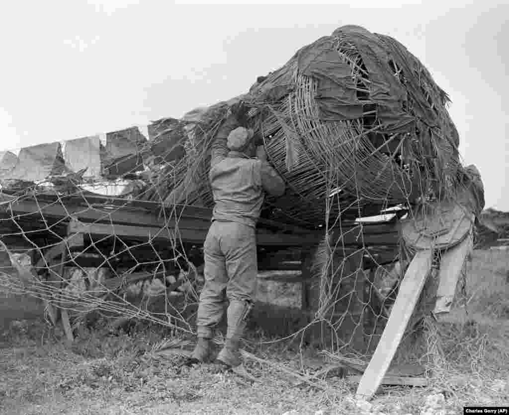 Entire wickerwork fighter planes left behind by retreating Japanese were discovered on Okinawa in 1945.