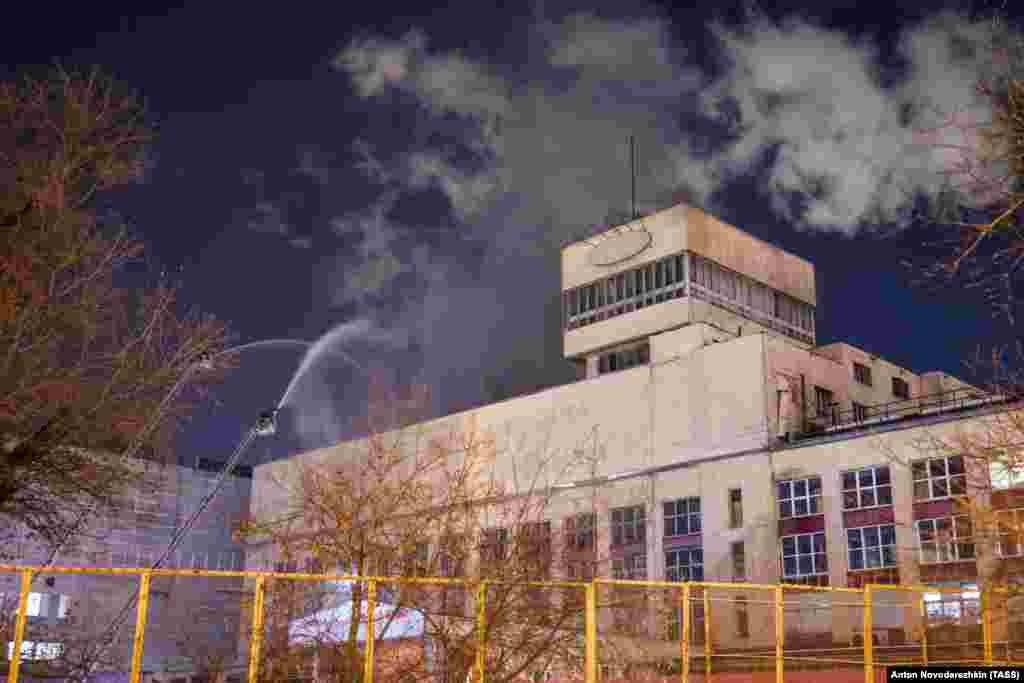 December 2: Firefighters hose down the roof of a meat-processing plant in Moscow. More than 100 firefighters were needed to extinguish the blaze. Twelve people were evacuated from the building and no one was injured. 