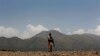 A Pakistani soldier stands guard near along the Afghan border. (file photo)