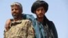 Feasts, Hugs, And Selfies: A Tantalizing Glimpse Of Possible Afghan Peace