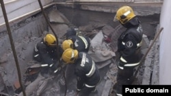 Rescue teams continue to search for survivors and casualties under the debris.