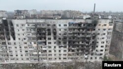 Поврежденные здания в Угледаре, Донецкая область, Украина, 27 января 2023 года