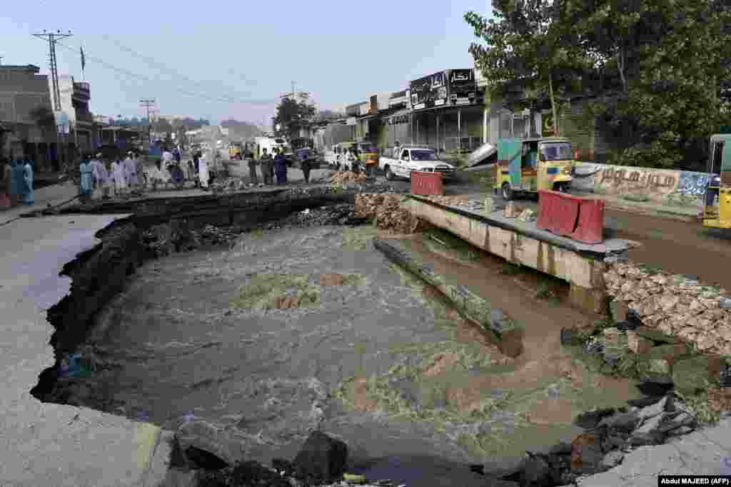 Because roads and bridges like this one in Khyber-Pakhtunkhwa Province are being washed away, authorities and NGOs are finding it difficult to reach more than 33 million people affected by the floods.