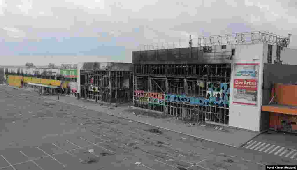 The shopping center photographed in April 2022 after being destroyed during fighting on Mariupol's outskirts. 