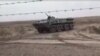 На видео, которое как сообщается было снято за три или четыре дня до столкновений 3 января между боевиками Талибана и туркменскими пограничниками на туркмено-афганской границе, видна военная техника на туркменской стороне границы. 