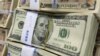 South Korea -- Stacks of US 100 dollar notes are pictured at the headquarters of the Exchange Bank in Seoul, 02Aug2011