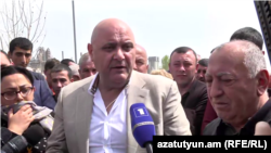 Armenia -- Sedrak Arustamian speaks to workers of a cement plant in Ararat, April 15, 2019.