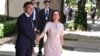 French President Emmanuel Macron (left) shakes hands with Moldovan President Maia Sandu in Chisinau on June 15.