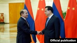 Հայաստանի վարչապետ Հովիկ Աբրահամյանի և իր չինացի գործընկեր Լի Կեցյանի հանդիպումը Պեկինում, 22-ը սեպտեմբերի, 2015թ. 