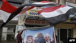 Poster cu liderii Hamas şi Fatah