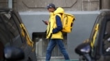 A worker of the Yandex Eda food delivery service in Moscow 