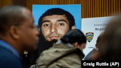 A photo of Sayfullo Saipov is displayed at a news conference at One Police Plaza on November 1.