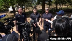 Ukrainian deminers hold a press briefing during a visit to the Peace Museum Mine Action in Siem Reap Province, northwestern Cambodia, on January 20.