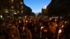 Protesters in Budapest carried torches and banners.