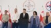 მოძრაობა „ერთიანი ნეიტრალური საქართველოს“ დამფუძნებლები (მარცხნიდან მარჯვნივ) ბიძინა გიორგობიანი, გელა ნიკოლაიშვილი, ვატო შაქარიშვილი, ნანა კაკაბაძე