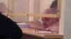 Лидер незарегистрированной партии "Алга" Владимир Козлов в зале суда. Актау, 16 августа 2012 года. Фото с сайта Twitter.