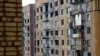 Ілюстративне фото. Пошкоджений внаслідок обстрілів багатоповерховий будинок в Авдіївці. Квітень 2016 року
