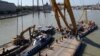 The Mermaid, which sank in the Danube in 2019, is lifted from the river as part of a salvage operation. (file photo)