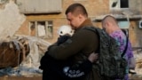 Survivors Of Russia's Attack On Kyiv Sort Through Aftermath2 GRAB